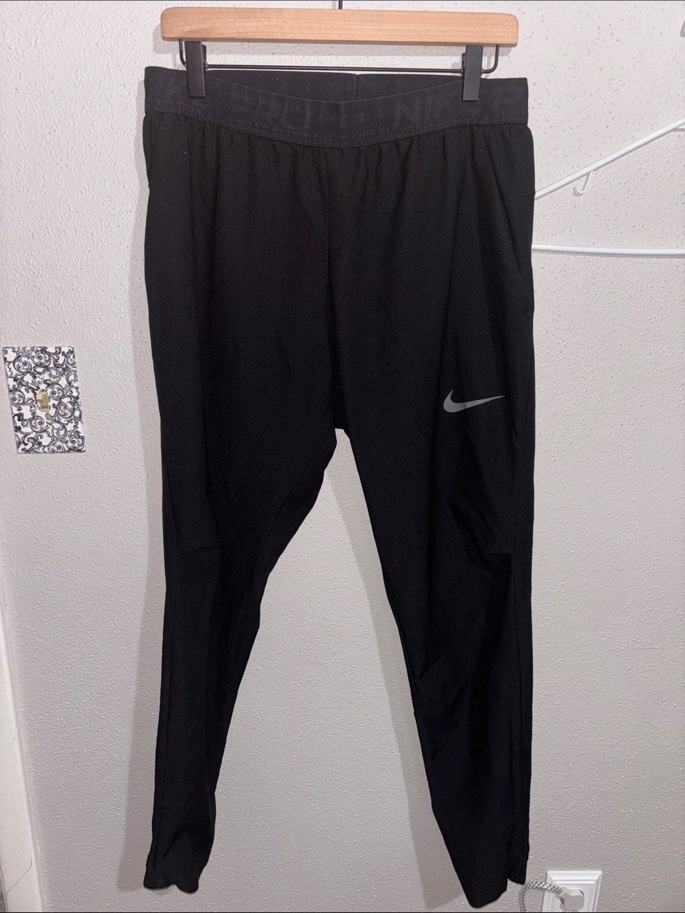 Nike - Men’s Black Jogger Pants with Reflective Swoosh (size Medium)